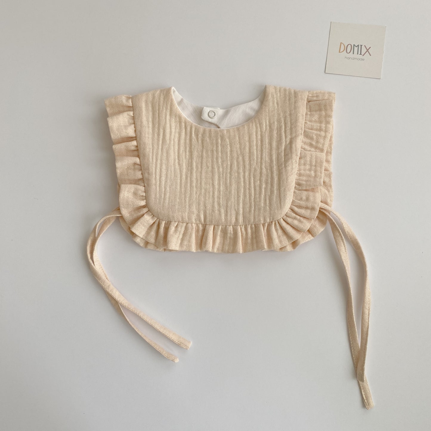 Shimmer Frill Bib