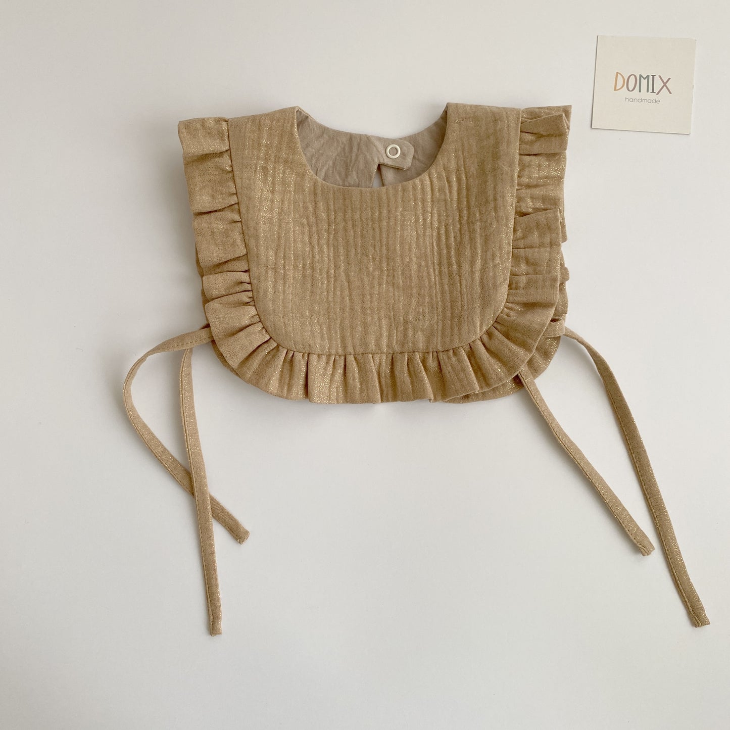 Shimmer Frill Bib