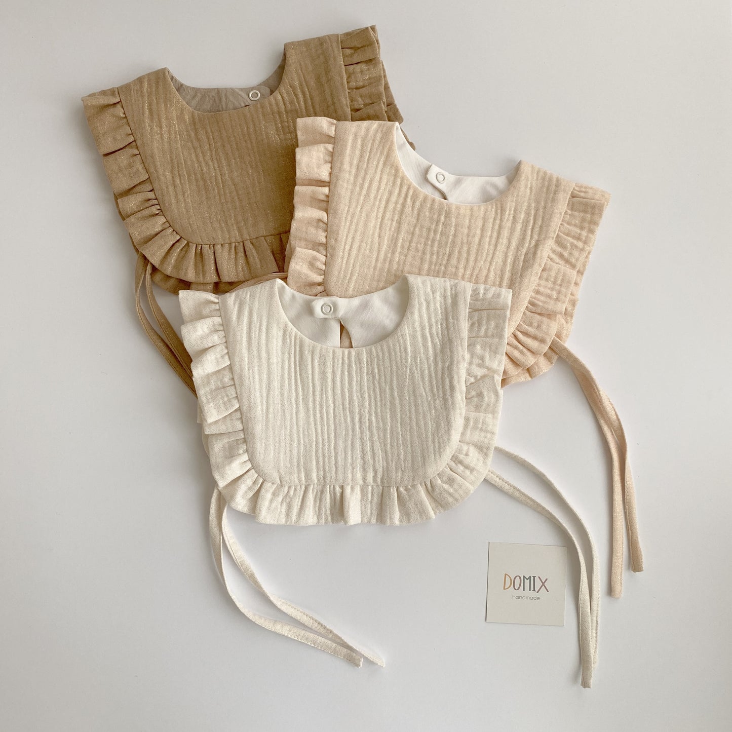 Shimmer Frill Bib